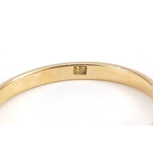 1670 - 18ct gold diamond five stone ring, the three central diamonds each approximately 3mm in diameter, th... 