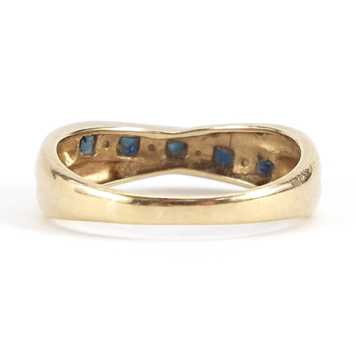 1879 - 9ct gold sapphire and clear stone crossover ring, size R, 2.9g