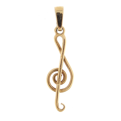 2142 - 9ct gold treble clef musical pendant, 3.0cm high, 1.0g