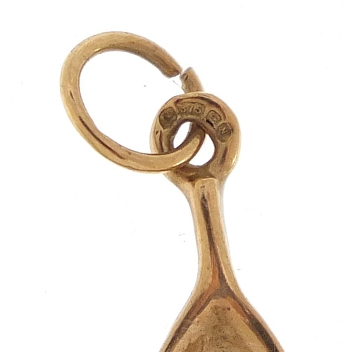 2126 - 9ct gold wishbone charm, 2.0cm high, 0.6g