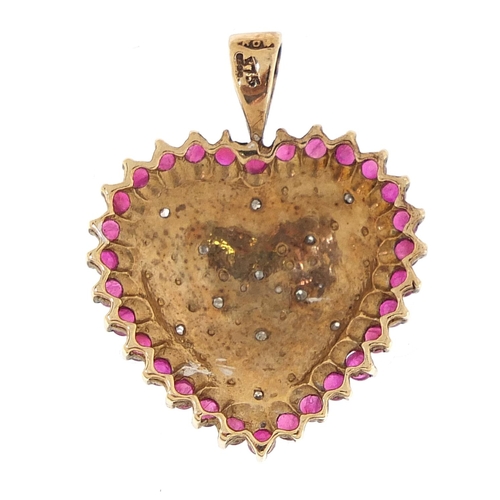 1642 - 9ct gold ruby and diamond love heart pendant, 2.5cm high, 3.4g