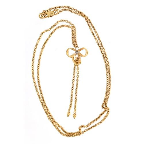 2006 - 9ct gold bow design necklace set with a diamond, 47cm in length, 2.3g