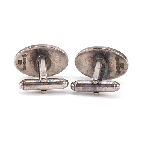 1983 - Pair of silver and blue enamel cufflinks housed in a fitted box, 2.0cm high, 13.1g