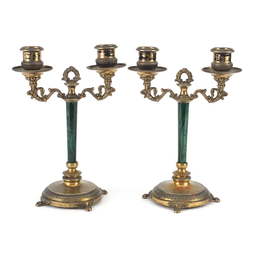 1 - Pair of French Napoleon III silver gilt two branch candelabras with malachite columns, each 21cm hig... 