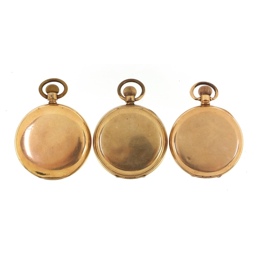 2172 - Two gold plated full hunter pocket watches and a Waltham gold plated open face pocket watch, the lar... 