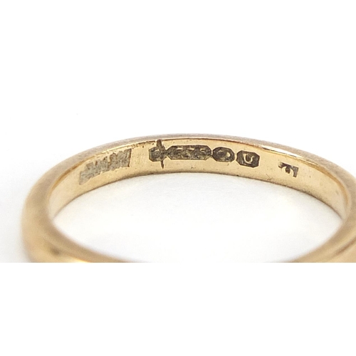 2011 - Two 9ct gold wedding bands and a 9ct gold clear stone eternity ring, sizes H, K and N, 4.2g