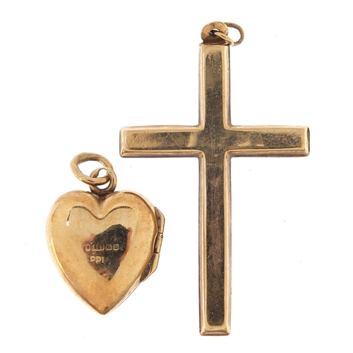 1805 - 9ct gold jewellery comprising love heart locket, cross pendant and garnet ring, the pendant 3.5cm hi... 