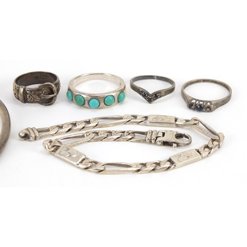 2102 - Silver jewellery including Figaro link bracelet, rings and bangle, 31.5g