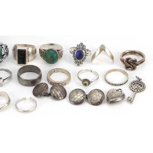 2177 - Collection of silver and white metal rings, lockets and cufflinks, some set with semi precious stone... 