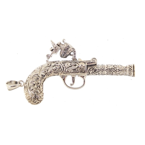 2137 - Sterling silver whistle pendant in the form of a pistol, 7cm high, 21.0g