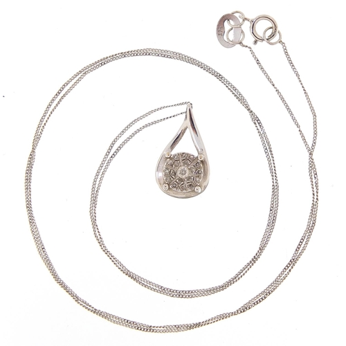 1726 - 9ct white gold diamond pendant on chain and matching stud earrings, the pendant 1.4cm high, total 2.... 