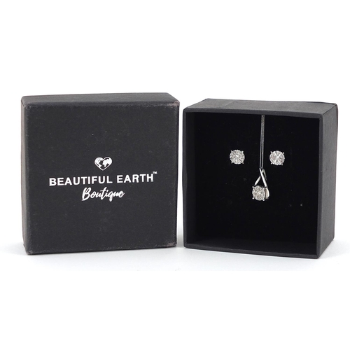 1726 - 9ct white gold diamond pendant on chain and matching stud earrings, the pendant 1.4cm high, total 2.... 