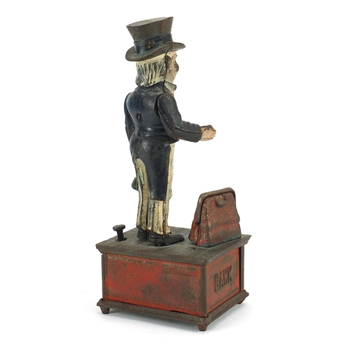 311 - American political interest Uncle Sam cast iron money box, 29cm high