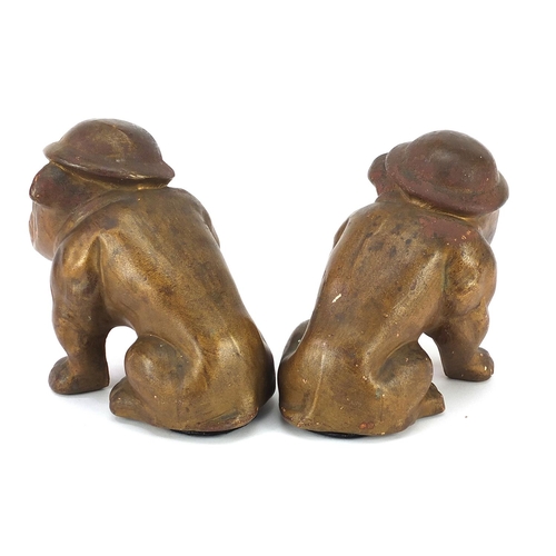 315 - Pair of military interest World War II Hitler Terror Bulldogs, each 15.5cm high