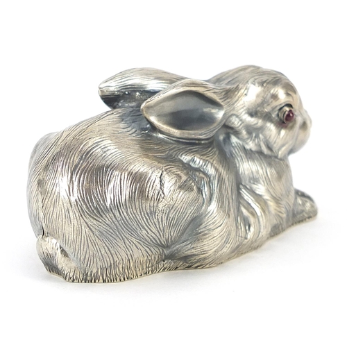 2286 - Silver recumbent rabbit paperweight with ruby eyes, impressed Russian marks to the base, 6.8cm in le... 