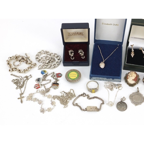 2173 - Silver and white metal jewellery including bracelets, skull ring, dolphin earrings and necklaces, to... 