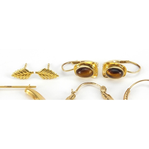 1807 - 9ct gold earrings including a pair of tiger's eye examples, the largest 4cm high, total 7.0g