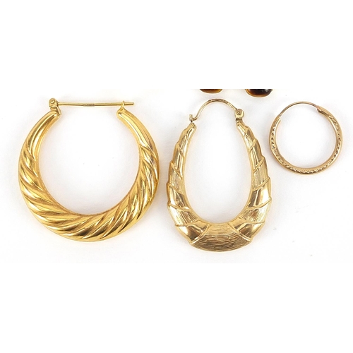 1807 - 9ct gold earrings including a pair of tiger's eye examples, the largest 4cm high, total 7.0g