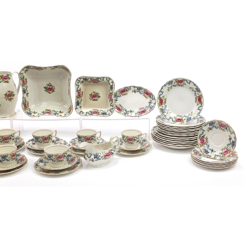 1335 - Booth's Floradora dinner and teaware, some by Royal Doulton including dinner plates, teacups and sau... 