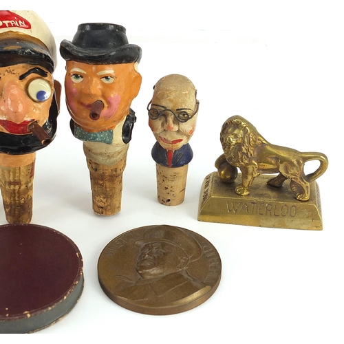 421 - Political interest collectables including a Winston Churchill bronze medallion and painted bottles s... 