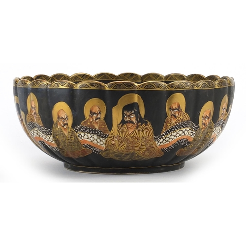 254 - Japanese Satsuma pottery bowl hand painted with immortals, character marks to the base, 24cm in diam... 