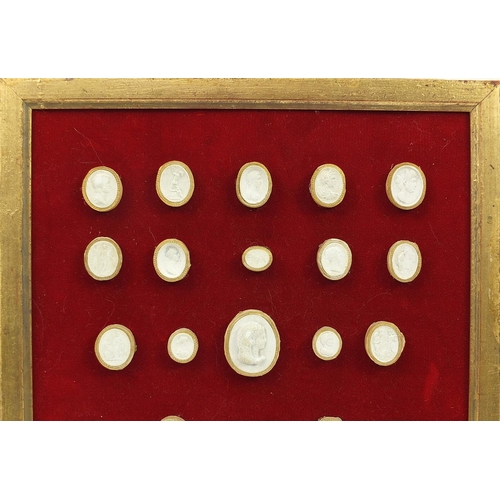 278 - Collection of Grand Tour plaster cameos arranged in two framed displays, the largest cameo 4cm x 3.5... 