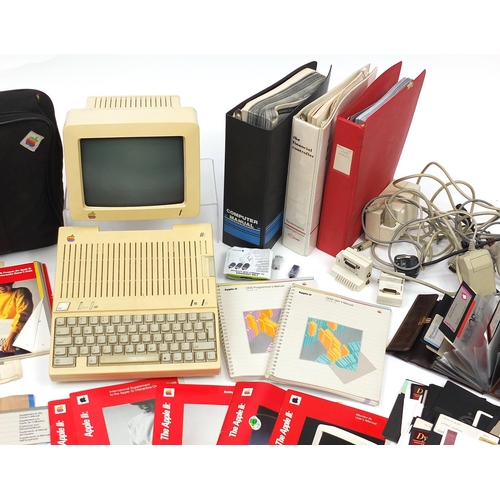 1176 - Vintage Apple IIC computer with keyboard, manuals and accessories