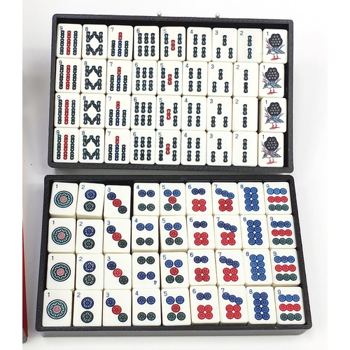 1514 - Poker chip set with carry case and Mahjong game, the poker chip case 58cm in length