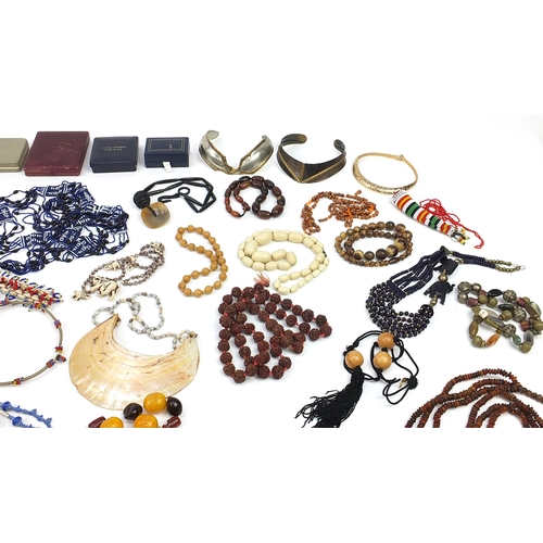 1387 - Middle Eastern jewellery including amber coloured beads, African beadwork and horn bead necklaces