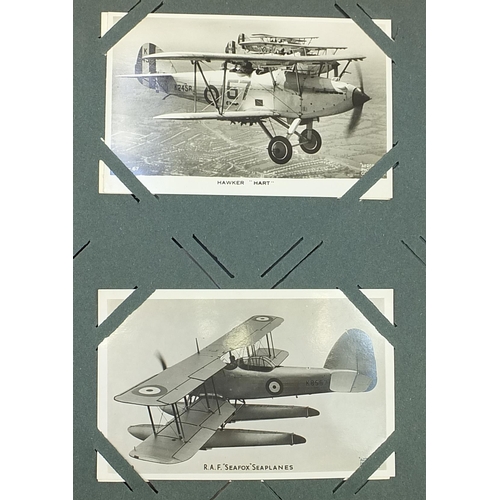 674 - Collection of early 20th century and later postcards, some arranged in albums including planes, topo... 