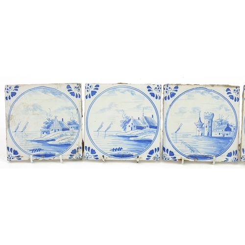 1238 - Set of six Delft tiles hand painted with landscapes, each 13cm x 13cm