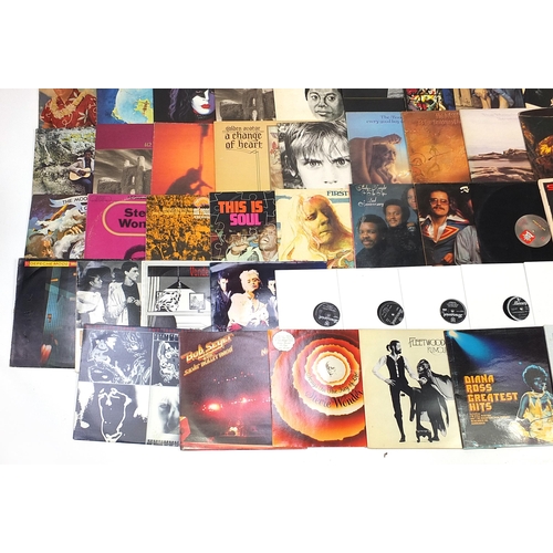 1429 - Vinyl LP records including Status Quo, U2, The Moody Blues, Stevie Wonder, The Rolling Stones and Fl... 