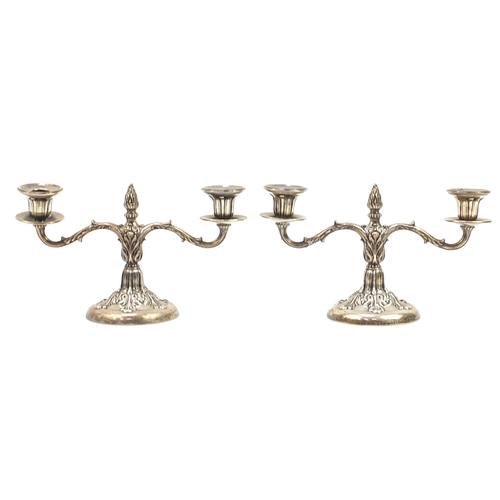 2223 - Birks, pair of sterling silver two branch candelabra embossed with foliage, 27cm wide, 1256.5g