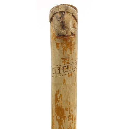 1209 - Cypriot walking stick with carved figural handle, 79cm in length