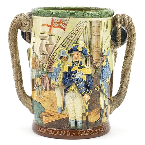 31 - Large Nelson interest Royal Doulton commemorative twin handled loving cup designed by Harry Fenton, ... 