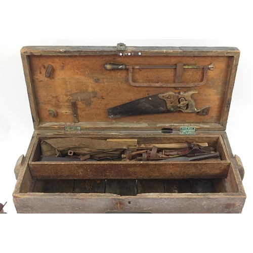 930 - Collection of vintage woodworking tools housed in an antique pine chest including wood planes, squar... 