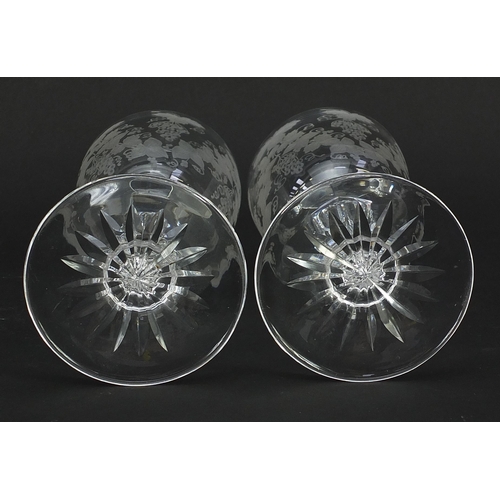 45 - Pair of Edwardian cut glasses etched with leaves and berries, each 18.5cm high