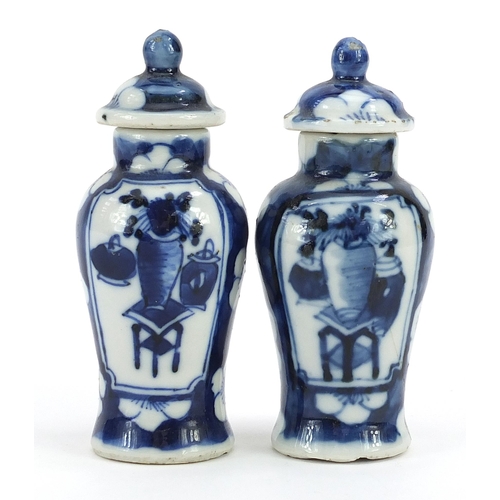 86 - Pair of miniature Chinese blue and white porcelain baluster vases with covers hand painted with luck... 