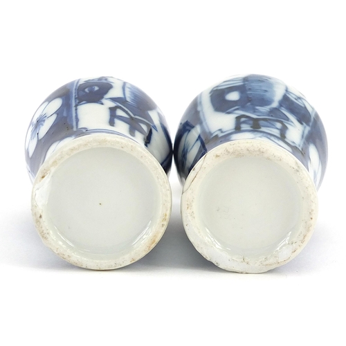 86 - Pair of miniature Chinese blue and white porcelain baluster vases with covers hand painted with luck... 