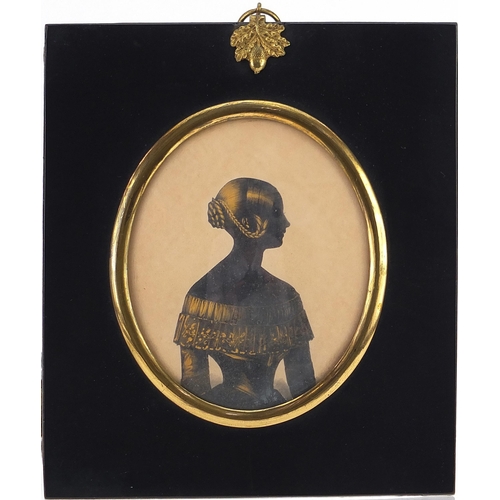 120 - 19th century oval hand painted silhouette miniature of a young female housed in an ebonised frame, i... 