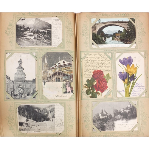 683 - Collection of early 20th century social history and topographical German postcards arranged in an al... 