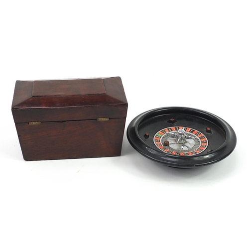 759 - Victorian mahogany tea caddy with twin divisional interior and vintage Bakelite roulette wheel, the ... 