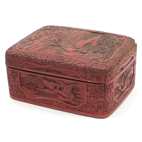 204 - Large Chinese cinnabar lacquer box and cover carved with cranes in a landscape, 12cm H x 27.5cm W x ... 