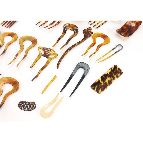 755 - Collection of vintage faux tortoiseshell hair pieces and combs, the largest 19.5cm wide