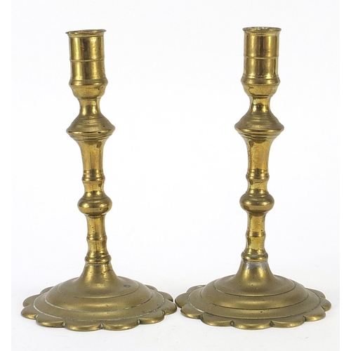 126 - Pair of 18th century turned brass candlesticks, 19cm high