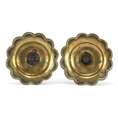 126 - Pair of 18th century turned brass candlesticks, 19cm high