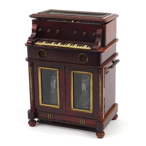 181 - Novelty 19th century hardwood musical liqueur cabinet in the form of a piano with lift up top and op... 