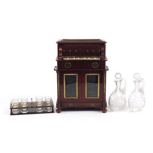 181 - Novelty 19th century hardwood musical liqueur cabinet in the form of a piano with lift up top and op... 