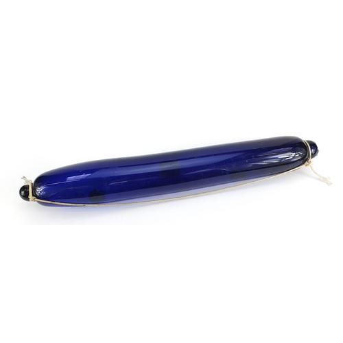 454 - Large 19th century Bristol Blue glass rolling pin with remnants of paint, 72cm in length