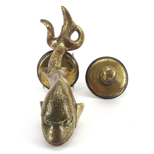 275 - Regency gilt brass dolphin door knocker, 22cm high